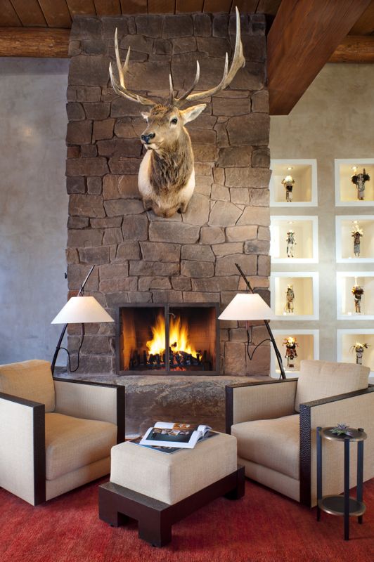 Wilderness Gate deer head above fireplace