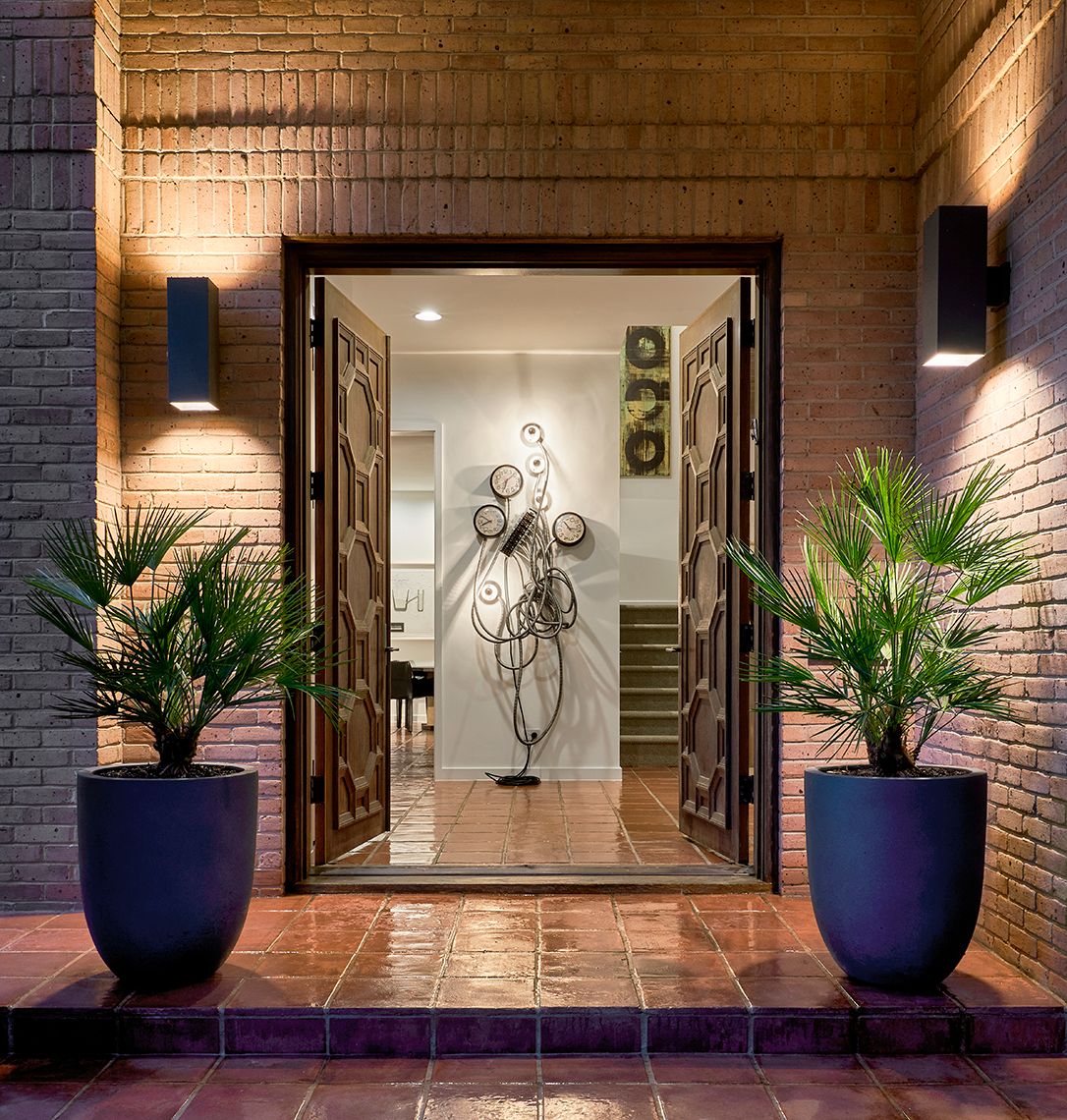 entrance into home with porch lights