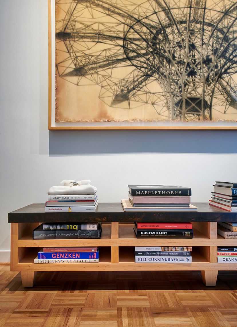 side table with books in walkway